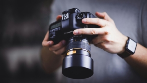 A man holding a camera